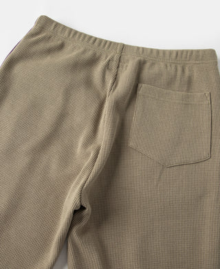 Khaki waffle-knit jogger pants with side pocket and relaxed back yoke