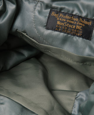 Olive helmet bag interior label and stitched pocket