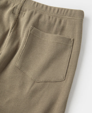 Khaki jogger pants with back patch pocket and waffle-knit texture