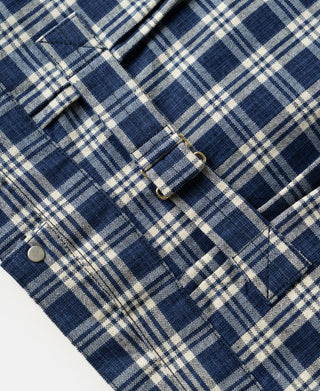 Plaid work jacket in blue and white with snap cuffs and button detail