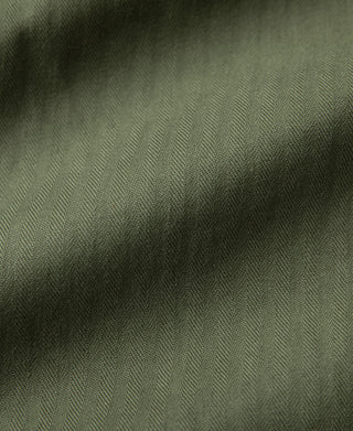 Olive woven utility jacket fabric texture close-up