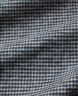 Blue-and-white houndstooth lining fabric close-up