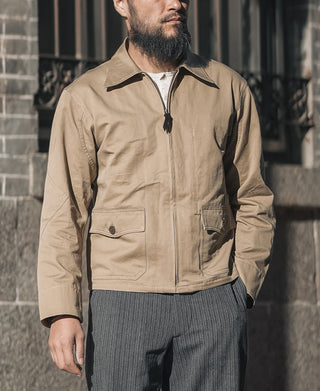 Khaki flight jacket with stand collar, zipper front, and two flap chest pockets