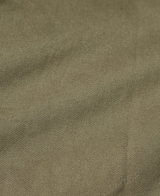 Khaki green jacket fabric texture with fine woven pattern