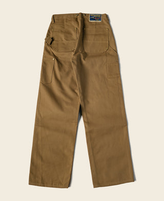 Brown canvas double-knee work pants with side cargo pocket and button waist