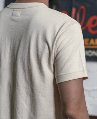 Apricot athletic T-shirt back view with crew neckline and short sleeves.