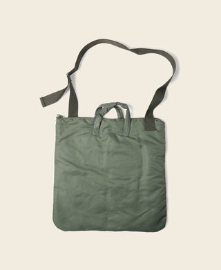 Olive zippered tote bag with short handles and long shoulder strap, plain back