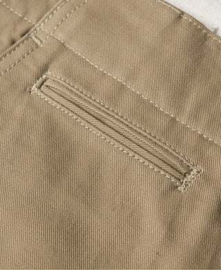 Khaki officer trousers, front pocket welt with stitched buttonhole detail