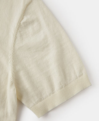 Light cream jersey knit short sleeve with ribbed cuff and stitched shoulder seam