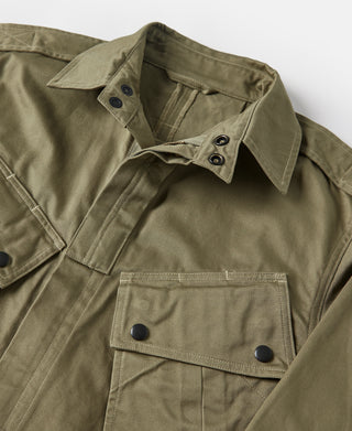 Khaki green M-42 jacket close-up of collar, button placket, and front flap pockets