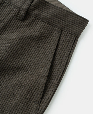 Front pocket and waistband detail on dark coffee pique stripe cotton trousers.