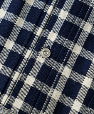Blue-and-white plaid work jacket button front detail