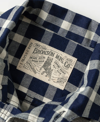 Plaid work jacket interior label at collar, BRONSON MFG CO