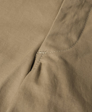Khaki officer trousers cuff seam and pocket edge with curved stitching