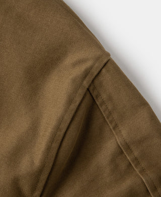Brown cossack jacket sleeve with stitched seam detail