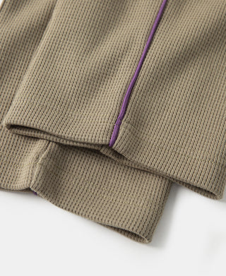 Khaki jogger pants with purple side stripe and ribbed hem cuff detail