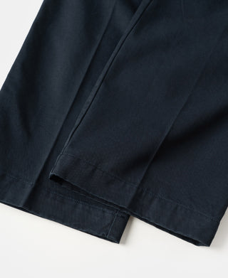 Navy trouser hem with stitched cuff and side seam detail