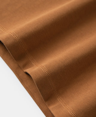 Vintage long-sleeve henley shirt fabric and stitching detail in dark orange